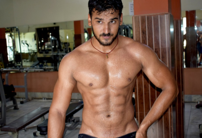 a topless man